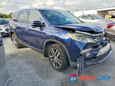 Czwarte zdjęcie samochodu z boku: 2016 HONDA PILOT TOURING VIN:5FNYF5H94GB008454 - miniatura