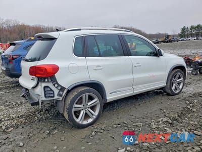 Trzecie zdjęcie samochodu z tyłu: 2016 VOLKSWAGEN TIGUAN S VIN:WVGBV7AX8GW091360 - miniatura