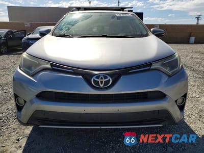 Piąte zdjęcie samochodu w środku: 2016 TOYOTA RAV4 XLE VIN:2T3WFREV7GW271905 - miniatura