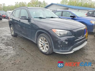 Czwarte zdjęcie samochodu z boku: 2015 BMW X1 XDRIVE28I VIN:WBAVL1C50FVY25636 - miniatura