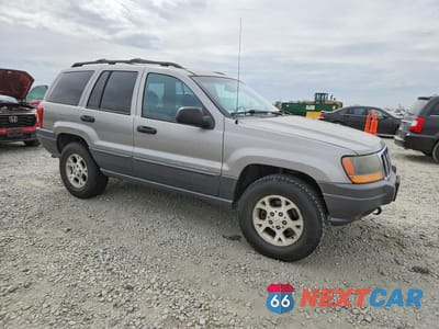 Czwarte zdjęcie samochodu z boku: 2001 JEEP GRAND CHEROKEE LAREDO VIN:1J4GW48N51C561695 - miniatura