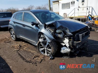 Czwarte zdjęcie samochodu z boku: 2018 HYUNDAI KONA LIMITED VIN:KM8K3CA55JU141339 - miniatura