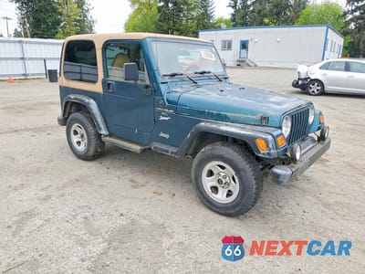 Czwarte zdjęcie samochodu z boku: 1997 JEEP WRANGLER / TJ SPORT VIN:1J4FY19S8VP524809 - miniatura