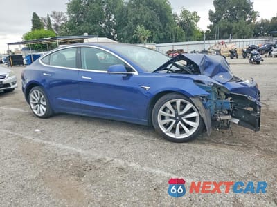 Czwarte zdjęcie samochodu z boku: 2018 TESLA MODEL 3 VIN:5YJ3E1EA5JF164479 - miniatura