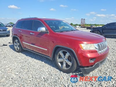 Czwarte zdjęcie samochodu z boku: 2012 JEEP GRAND CHEROKEE OVERLAND VIN:1C4RJFCT7CC297753 - miniatura