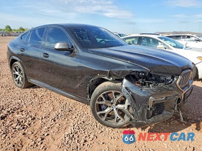 Czwarte zdjęcie samochodu z boku: 2021 BMW X6 M50I VIN:5UXCY8C07M9G38166 - miniatura