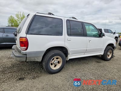 Trzecie zdjęcie samochodu z tyłu: 1999 FORD EXPLORER XLT VIN:1FMZU34X5XUA30534 - miniatura