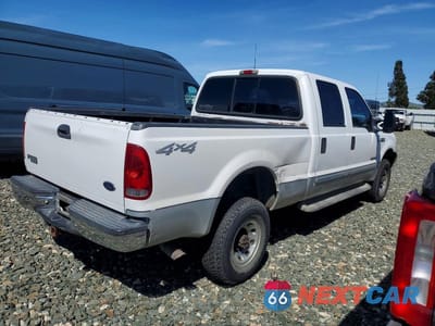 Trzecie zdjęcie samochodu z tyłu: 2002 FORD F350 SRW SUPER DUTY VIN:1FTSW31F72EC35559 - miniatura