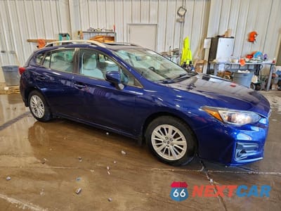Czwarte zdjęcie samochodu z boku: 2017 SUBARU IMPREZA PREMIUM PLUS VIN:4S3GTAD69H3706551 - miniatura