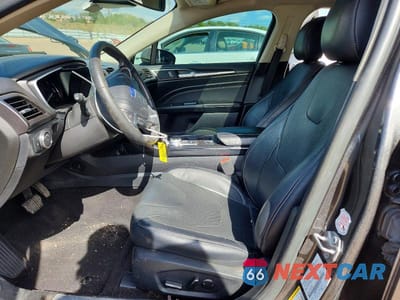 Zdjęcie 7 z 12 samochodu: 2019 FORD FUSION TITANIUM VIN:3FA6P0RU3KR240180 - miniatura
