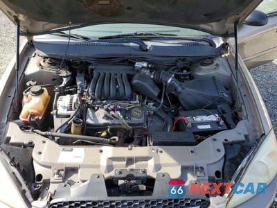 Zdjęcie 11 z 12 samochodu: 2002 FORD TAURUS LX VIN:1FAFP52202G210602 - miniatura