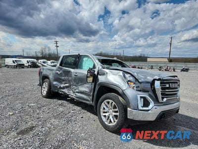 Czwarte zdjęcie samochodu z boku: 2019 GMC SIERRA K1500 SLT VIN:3GTU9DED9KG311970 - miniatura