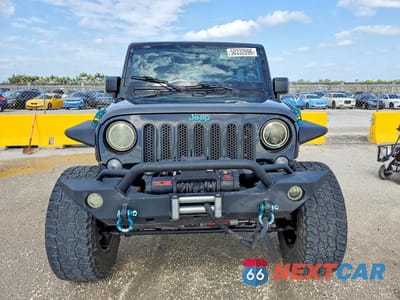 Piąte zdjęcie samochodu w środku: 2018 JEEP WRANGLER UNLIMITED SPORT VIN:1C4HJWDG0JL882703 - miniatura