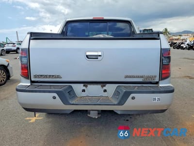 Zdjęcie 6 z 12 samochodu: 2013 HONDA RIDGELINE SPORT VIN:5FPYK1F71DB017461 - miniatura