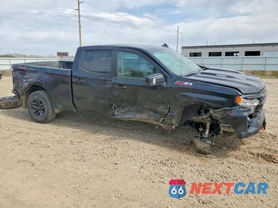 Czwarte zdjęcie samochodu z boku: 2024 CHEVROLET SILVERADO K1500 LT TRAIL BOSS VIN:3GCUDFE81RG120941 - miniatura