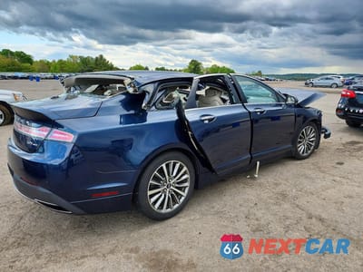 Trzecie zdjęcie samochodu z tyłu: 2017 LINCOLN MKZ SELECT VIN:3LN6L5D95HR619613 - miniatura