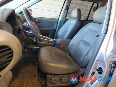 Zdjęcie 7 z 12 samochodu: 2003 HYUNDAI SANTA FE GLS VIN:KM8SC13E33U534115 - miniatura
