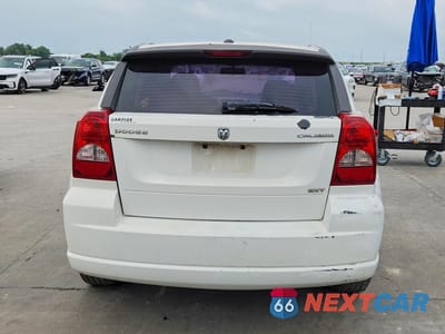 Zdjęcie 6 z 13 samochodu: 2009 DODGE CALIBER SXT VIN:1B3HB48A29D196886 - miniatura