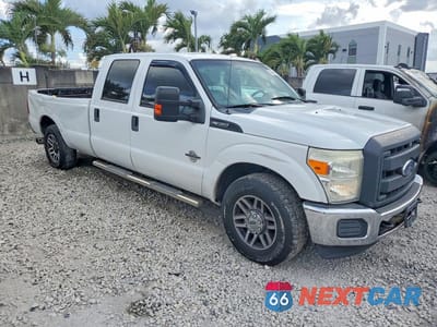 Czwarte zdjęcie samochodu z boku: 2015 FORD F350 SUPER DUTY VIN:1FT7W3AT8FEB95218 - miniatura