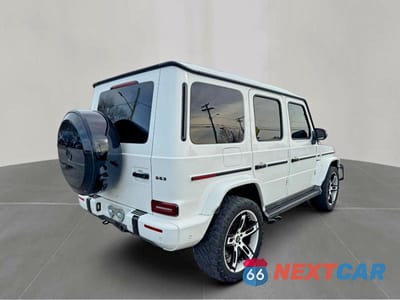 Czwarte zdjęcie samochodu z boku: 2021 MERCEDES-BENZ G 63 AMG VIN:W1NYC7HJ2MX405010 - miniatura