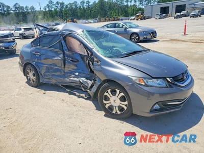 Czwarte zdjęcie samochodu z boku: 2013 HONDA CIVIC HYBRID VIN:19XFB4F23DE001337 - miniatura