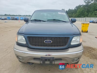 Piąte zdjęcie samochodu w środku: 2002 FORD F150 VIN:1FTRX18L82KB80262 - miniatura