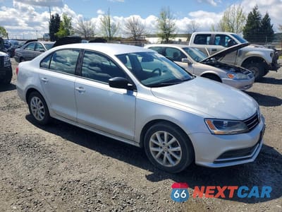Czwarte zdjęcie samochodu z boku: 2015 VOLKSWAGEN JETTA SE VIN:3VWD17AJ5FM283027 - miniatura