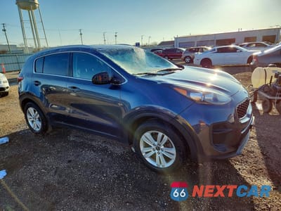 Czwarte zdjęcie samochodu z boku: 2018 KIA SPORTAGE LX VIN:KNDPM3AC0J7418600 - miniatura