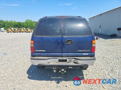 Zdjęcie 6 z 14 samochodu: 2001 CHEVROLET TAHOE C1500 VIN:1GNEC13T21J309366 - miniatura