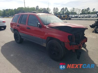Czwarte zdjęcie samochodu z boku: 1999 JEEP GRAND CHEROKEE LAREDO VIN:1J4G258S6XC578277 - miniatura