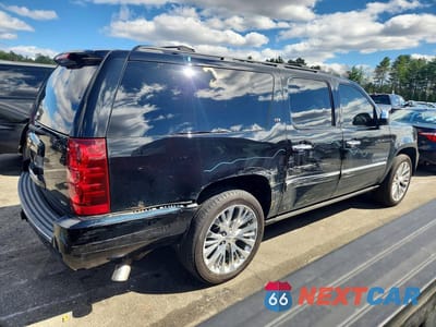 Trzecie zdjęcie samochodu z tyłu: 2014 CHEVROLET SUBURBAN K1500 LTZ VIN:1GNSKKE77ER149892 - miniatura