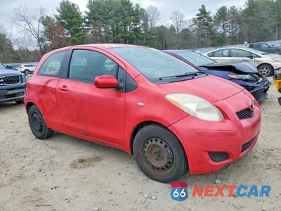Czwarte zdjęcie samochodu z boku: 2009 TOYOTA YARIS BASE VIN:JTDJT903795238504 - miniatura