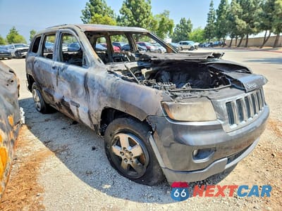 Czwarte zdjęcie samochodu z boku: 2011 JEEP GRAND CHEROKEE LAREDO VIN:1J4RR4GG8BC635647 - miniatura