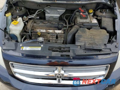Zdjęcie 12 z 13 samochodu: 2011 DODGE CALIBER MAINSTREET VIN:1B3CB3HA2BD227385 - miniatura