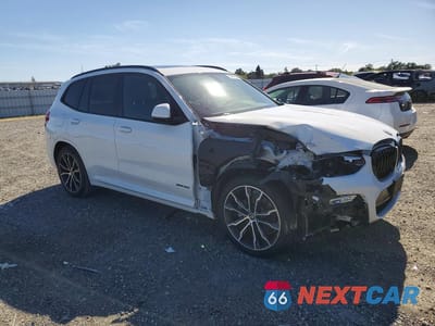 Czwarte zdjęcie samochodu z boku: 2018 BMW X3 XDRIVE30I VIN:5UXTR9C54JLC78500 - miniatura