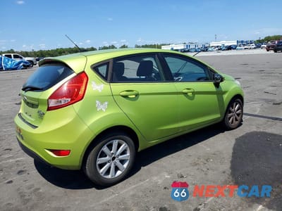 Trzecie zdjęcie samochodu z tyłu: 2011 FORD FIESTA SE VIN:3FADP4EJ8BM196040 - miniatura