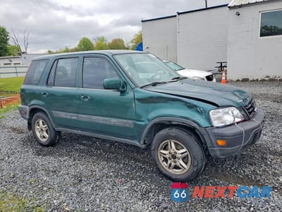 Czwarte zdjęcie samochodu z boku: 1999 HONDA CR-V EX VIN:JHLRD1860XC084939 - miniatura