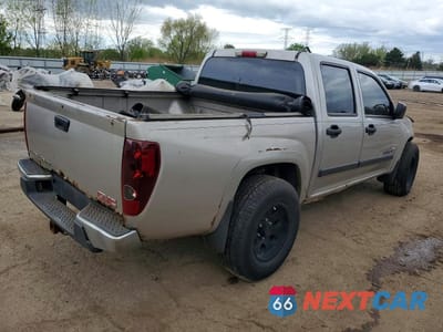 Trzecie zdjęcie samochodu z tyłu: 2004 GMC CANYON VIN:1GTDT136348106402 - miniatura