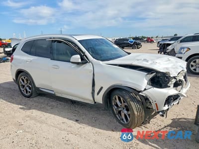 Czwarte zdjęcie samochodu z boku: 2020 BMW X3 XDRIVE30I VIN:5UXTY5C02L9D31985 - miniatura