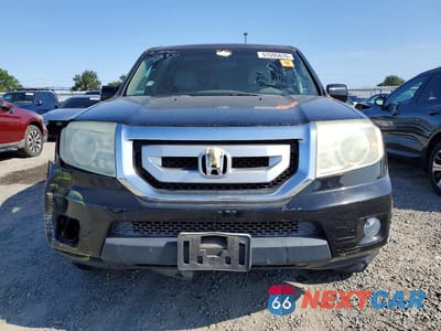 Piąte zdjęcie samochodu w środku: 2011 HONDA PILOT EX VIN:5FNYF4H48BB013891 - miniatura