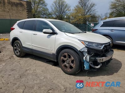 Czwarte zdjęcie samochodu z boku: 2017 HONDA CR-V EXL VIN:5J6RW2H80HL029711 - miniatura