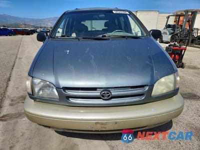 Piąte zdjęcie samochodu w środku: 1999 TOYOTA SIENNA XLE VIN:4T3ZF13C9XU150020 - miniatura