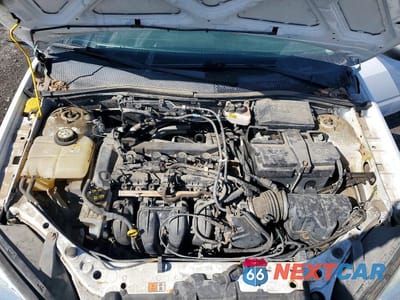 Zdjęcie 11 z 12 samochodu: 2007 FORD FOCUS ZX4 VIN:1FAFP34N27W354435 - miniatura