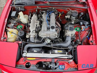 Zdjęcie 11 z 12 samochodu: 1990 MAZDA MX-5 MIATA VIN:JM1NA3515L0104977 - miniatura