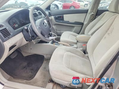Zdjęcie 7 z 12 samochodu: 2006 KIA SPECTRA EX VIN:KNAFE121X65284124 - miniatura