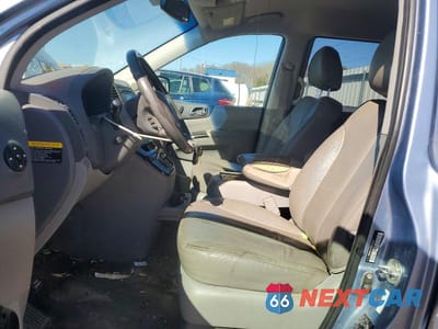Zdjęcie 7 z 12 samochodu: 2014 KIA SEDONA VIN:KNDMH4C71E6554954 - miniatura