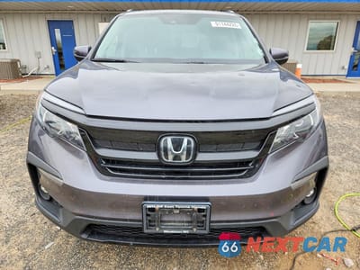 Piąte zdjęcie samochodu w środku: 2021 HONDA PILOT SE VIN:5FNYF6H26MB025387 - miniatura
