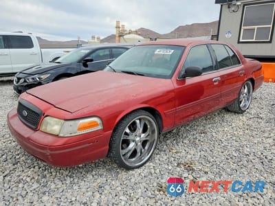 1999 FORD CROWN VICTORIA 2FAFP73W8XX176455 - główne zdjęcie licytacji z USA - miniatura