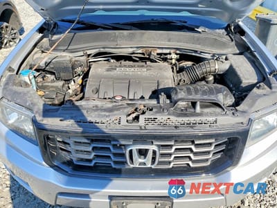 Zdjęcie 11 z 12 samochodu: 2014 HONDA RIDGELINE RTL-S VIN:5FPYK1F64EB014501 - miniatura