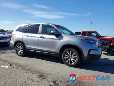 Czwarte zdjęcie samochodu z boku: 2021 HONDA PILOT EX-L VIN:5FNYF5H50MB021596 - miniatura